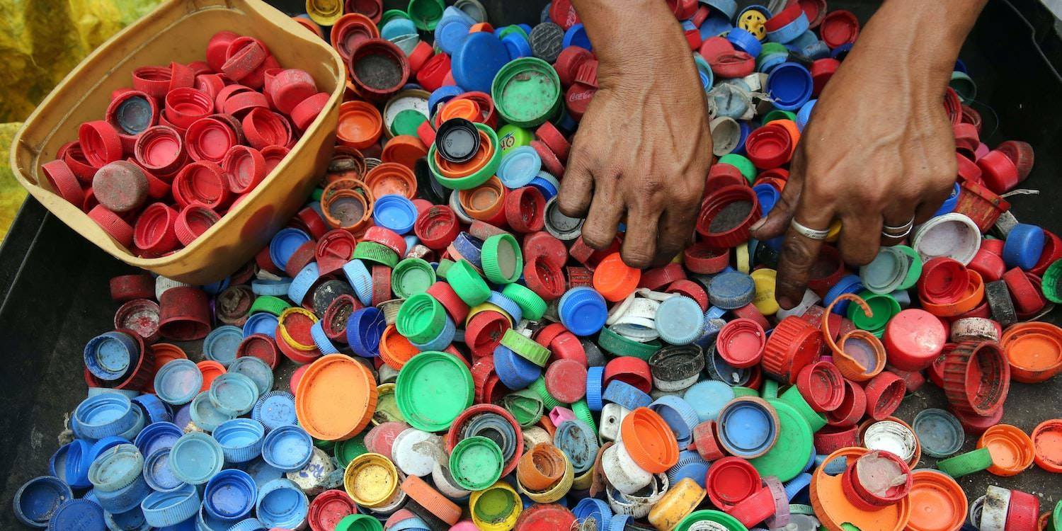 Hands Sorting Ocean Plastic