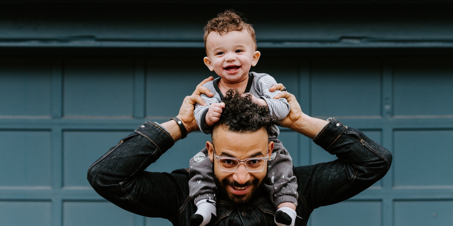 Father with Son on shoulders