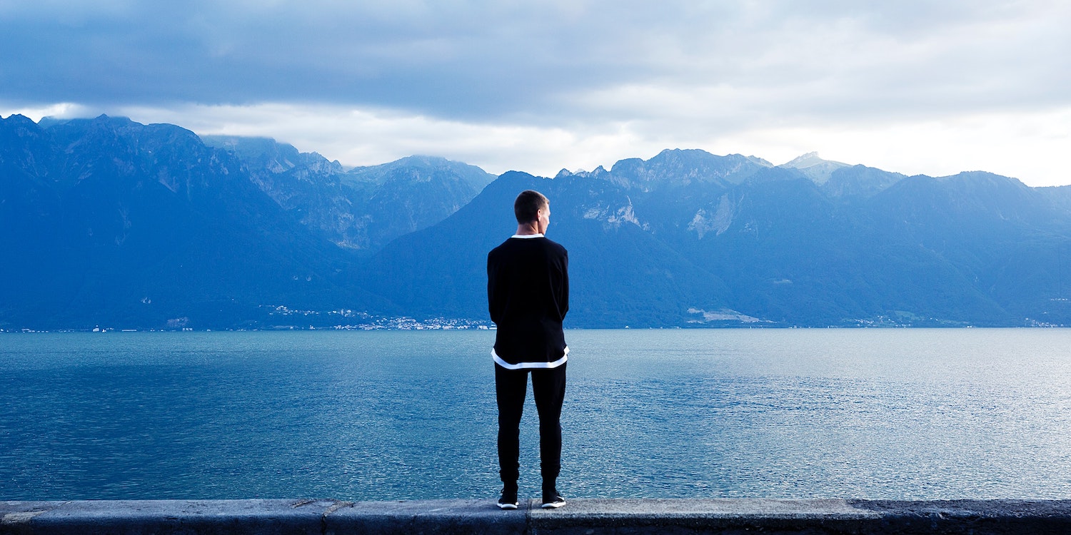 Man Looking At Lake
